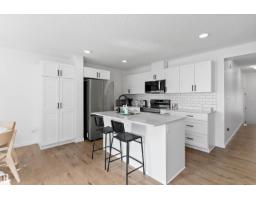 Laundry room - #8 13119 209 St Nw, Edmonton, AB T5S0R4 Photo 7