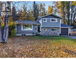Primary bedroom of 6653 ESSEX CRESCENT · Prince George, BC