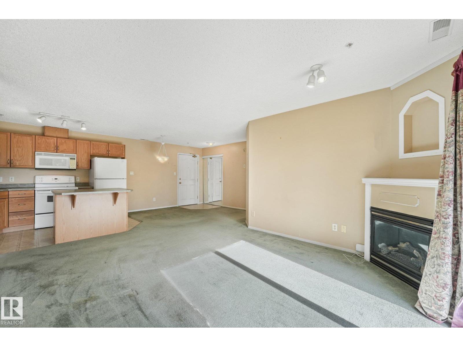 #204 16303 95 ST NW - 12