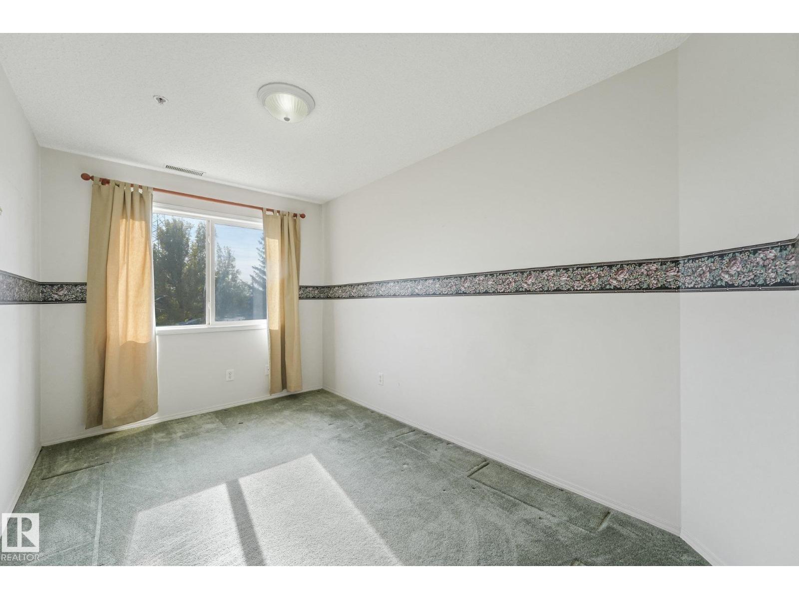 #204 16303 95 ST NW - 23