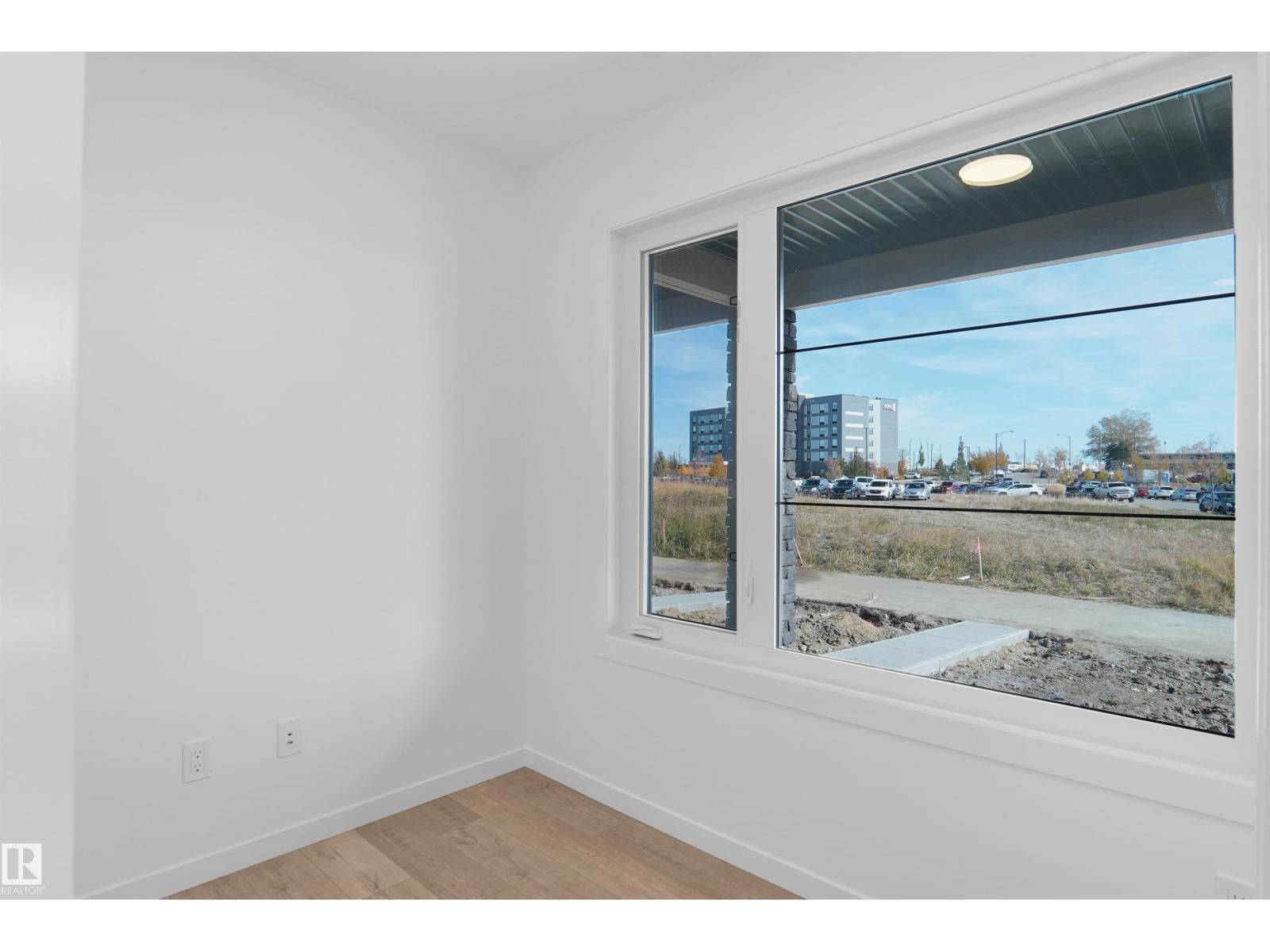#4 – 150 Cashman Crescent SW, Cashman — photo 5 of 25: Property photo