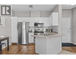 Living room - 427, 345 Rocky Vista Park Nw, Calgary, AB T3G5K6 Photo 6