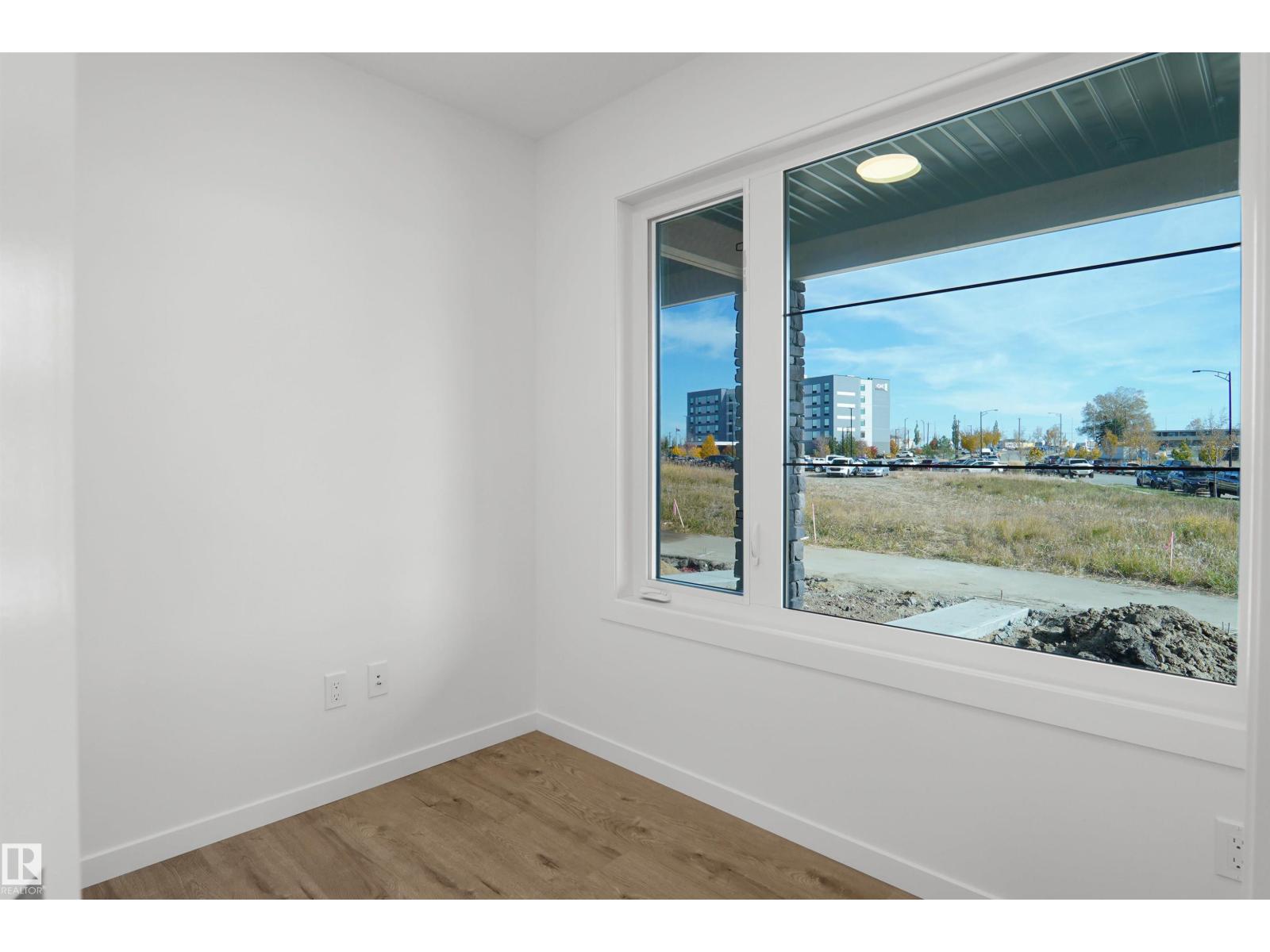 #5 – 150 Cashman Crescent SW, Cashman — photo 4 of 27: Property photo
