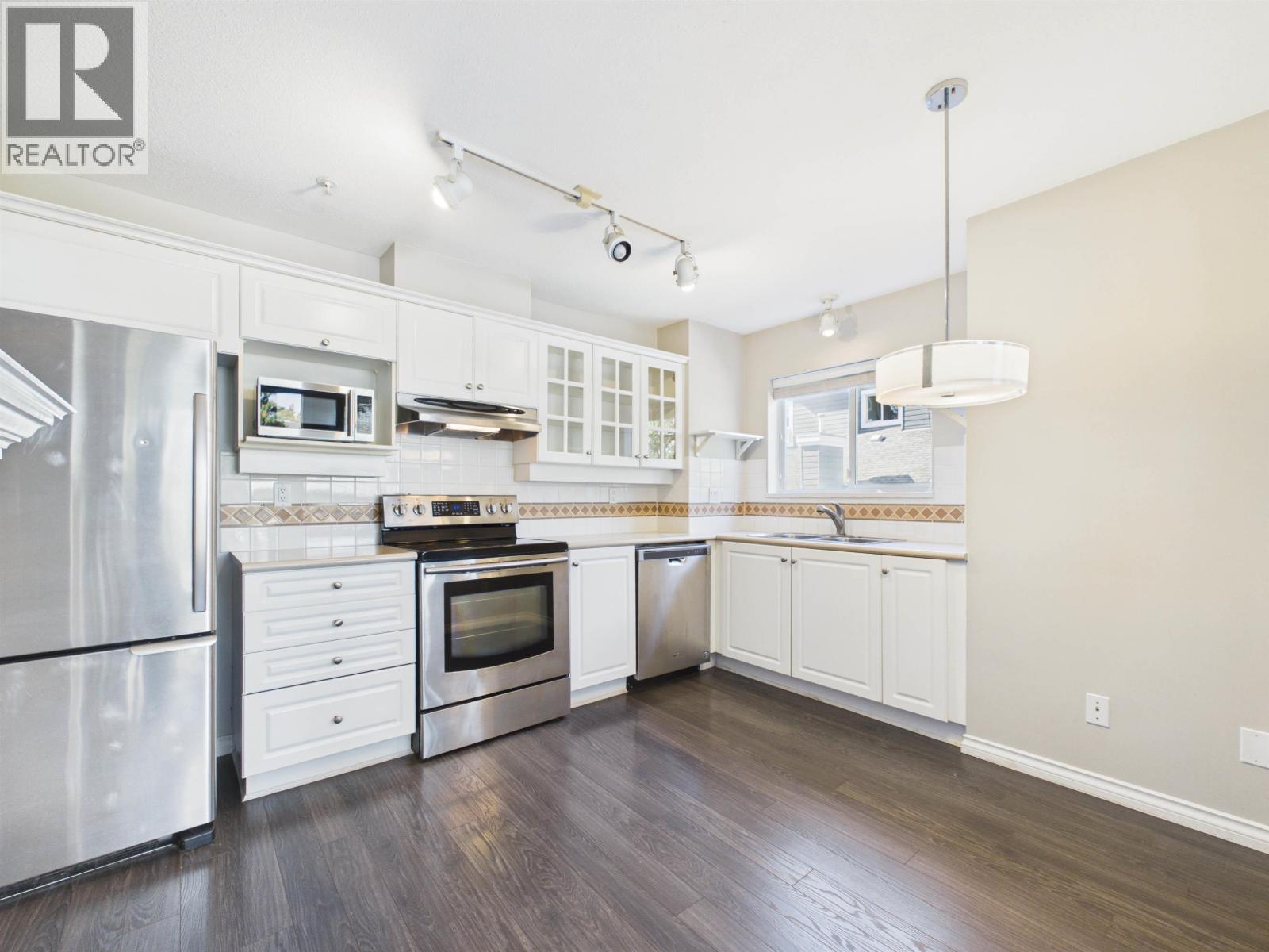 Photo of 215 12931 RAILWAY AVE AVENUE 23