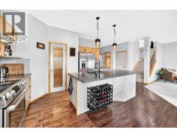 2pc Bathroom - 18 West Pointe Way, Cochrane, AB T4C0B9 Photo 7