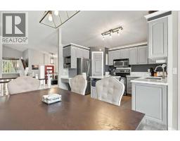Den - 5 Riverview Court, Cochrane, AB T4C1K6 Photo 11