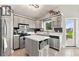 2pc Bathroom - 5 Riverview Court, Cochrane, AB T4C1K6 Photo 9