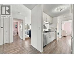 220, 2022 Canyon Meadows Drive Se, Calgary, AB T2J7H1 Photo 9