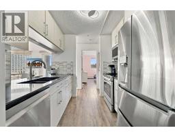 220, 2022 Canyon Meadows Drive Se, Calgary, AB T2J7H1 Photo 14