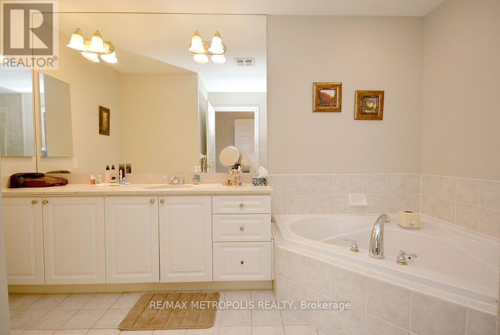 25 Kingsbridge Garden Circle — photo 17