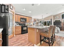 Living room - 34 Billy Haynes Trail, Okotoks, AB T1S2N9 Photo 7