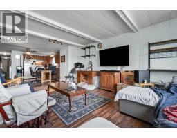 Living room - 335, 6220 17 Avenue Se, Calgary, AB T2W0A6 Photo 7