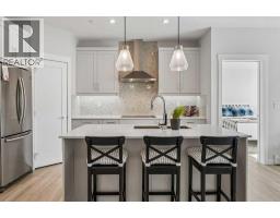 303, 35 Walgrove  SE - photo 4