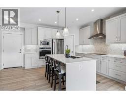 303, 35 Walgrove  SE - photo 5