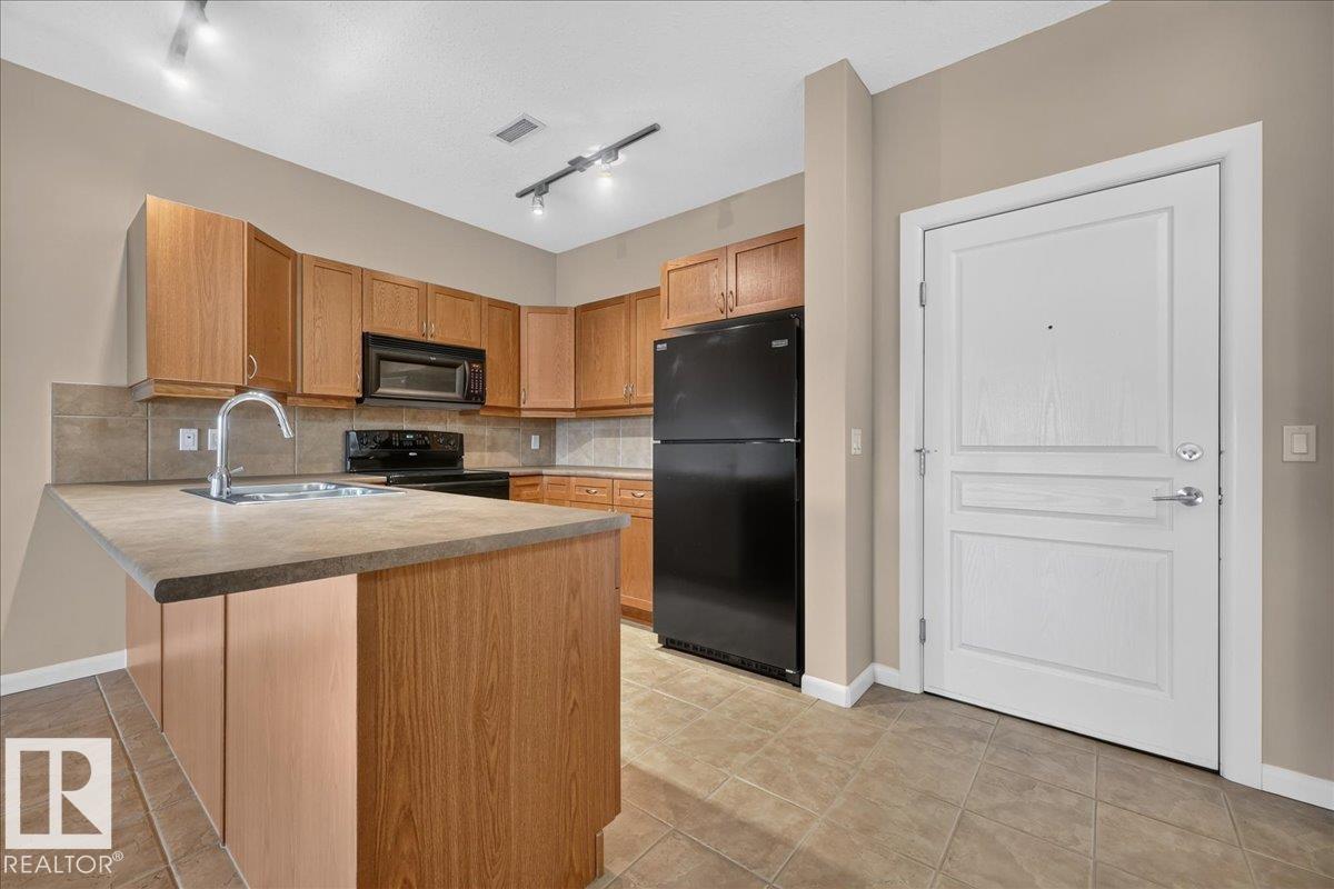 #217 – 160 Magrath Road NW, Magrath Heights — photo 5 of 30: Property photo