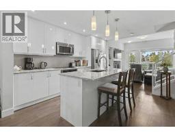 304, 20 Brentwood Common NW - photo 3