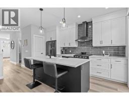 Primary Bedroom - 236 Rowmont Boulevard Nw, Calgary, AB T3L0H3 Photo 10