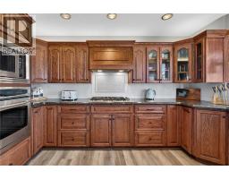 Bedroom - 38 West Mitford Crescent, Cochrane, AB T4C1L1 Photo 11