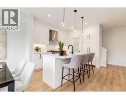 Family room - 35, 7825 Spring Willow Drive Sw, Calgary, AB T3H6C9 Photo 6