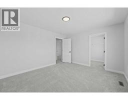 Bedroom - 35 Creekside Rise Sw, Calgary, AB T3X5V9 Photo 10