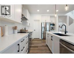 Laundry room - 59 Sundown Place, Cochrane, AB T4C2T3 Photo 10