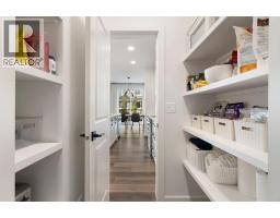 Laundry room - 59 Sundown Place, Cochrane, AB T4C2T3 Photo 11