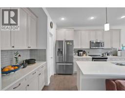 Family room - 48 Sundown Common, Cochrane, AB T4C2M9 Photo 12
