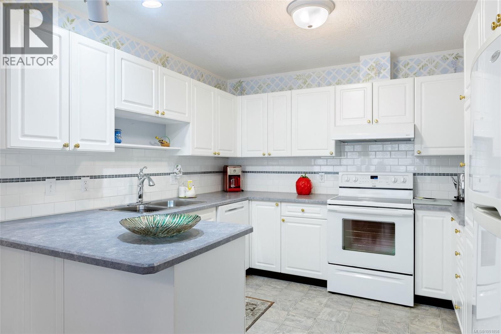 13 4619 Elk Lake Dr, Saanich - Image 1