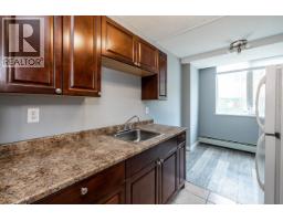Front exterior of 106 1501 QUEENSWAY · Prince George, BC