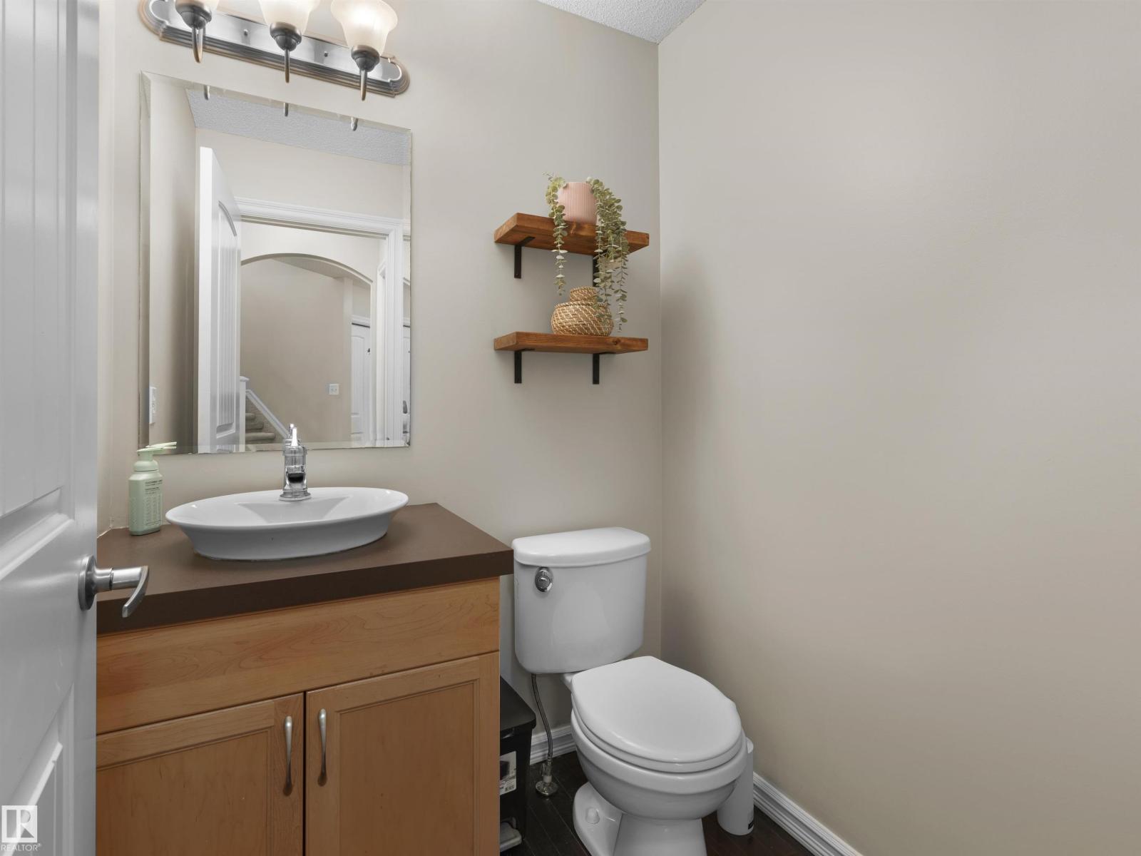 1175 36 Avenue NW, Tamarack — photo 13 of 30: Property photo