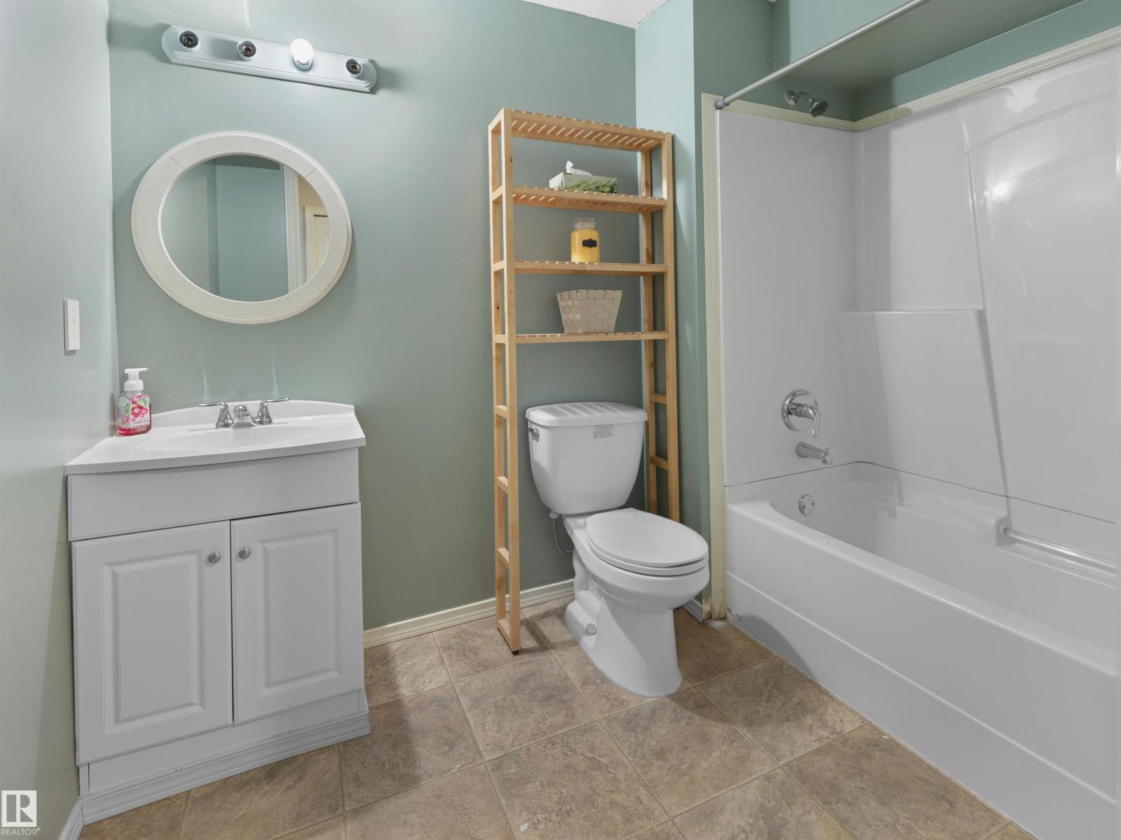 1175 36 Avenue NW, Tamarack — photo 25 of 30: Property photo