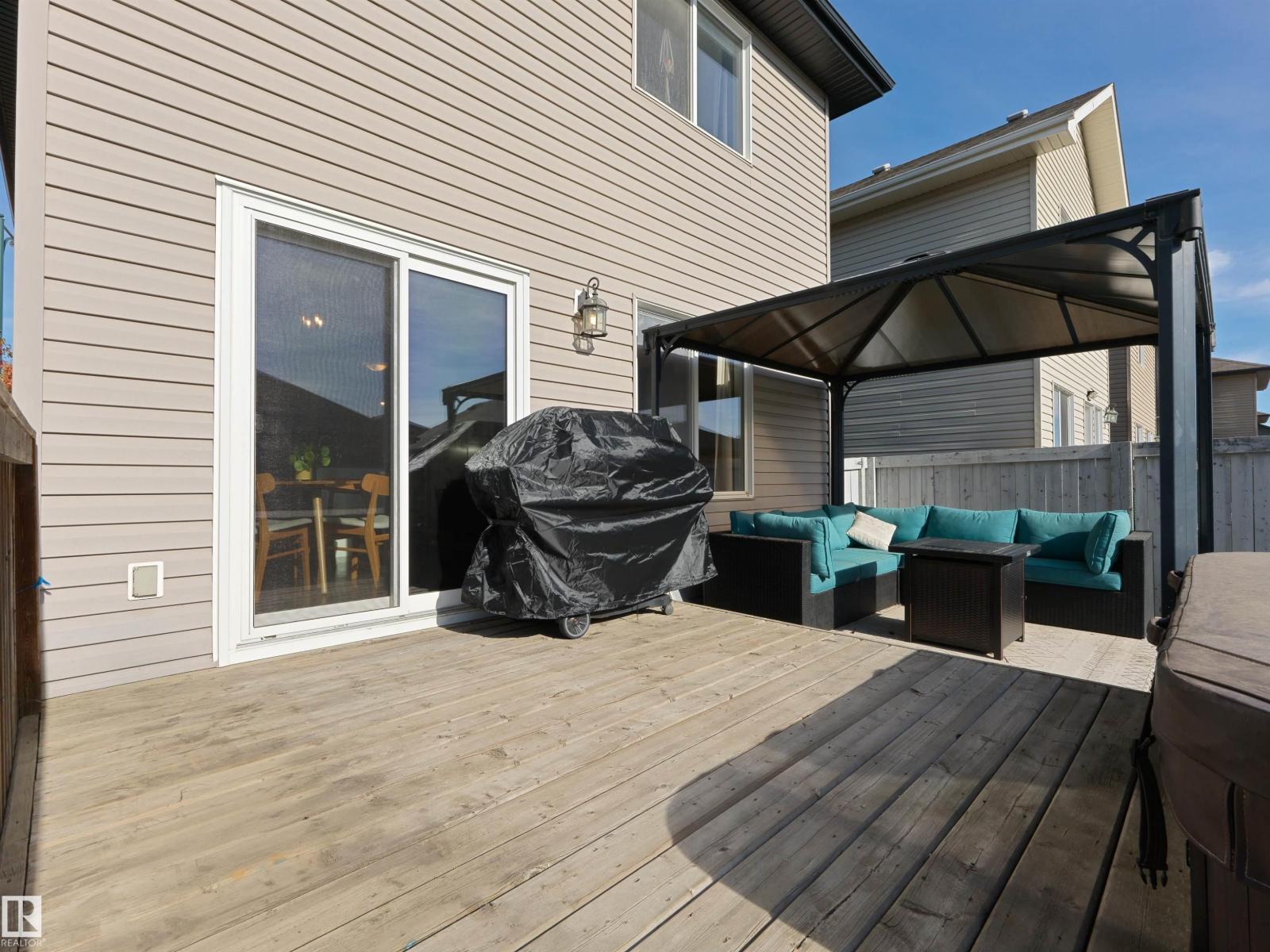 1175 36 Avenue NW, Tamarack — photo 29 of 30: Property photo