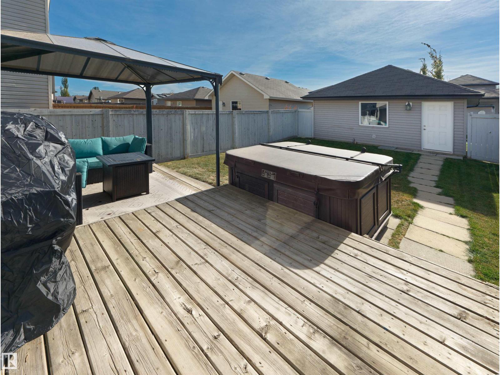 1175 36 Avenue NW, Tamarack — photo 30 of 30: Property photo