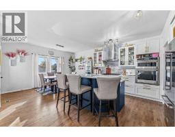 Family room - 2 Drake Landing Road, Okotoks, AB T1S2M7 Photo 15