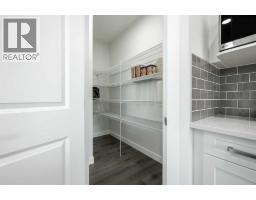 Laundry room - 20 Shetland Court, Cochrane, AB T3S0V3 Photo 12