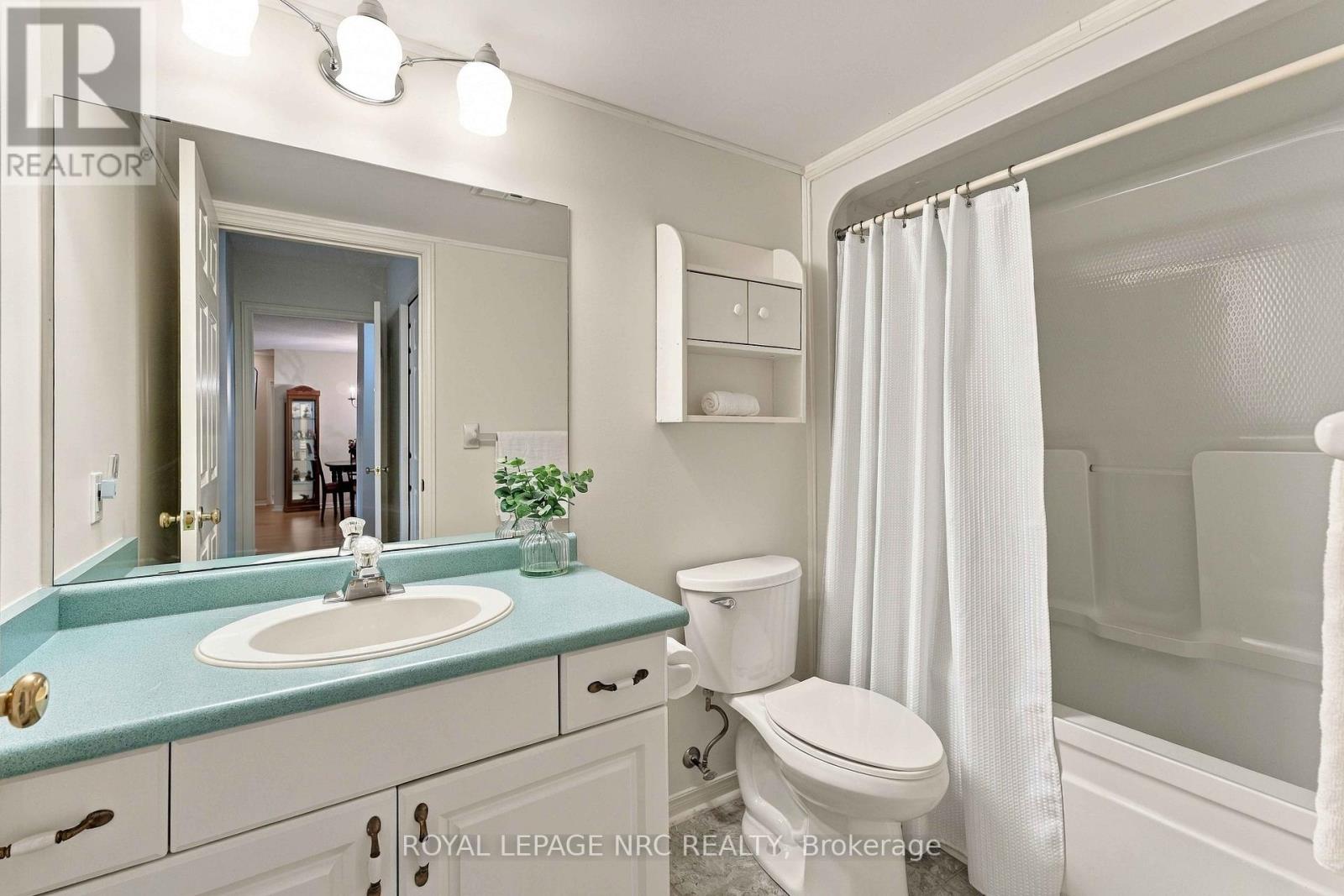 #104 4090 JOHN CHARLES BOULEVARD - 25
