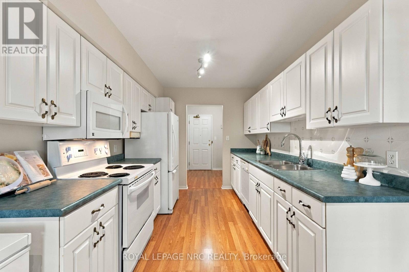 #104 4090 JOHN CHARLES BOULEVARD - Image 9