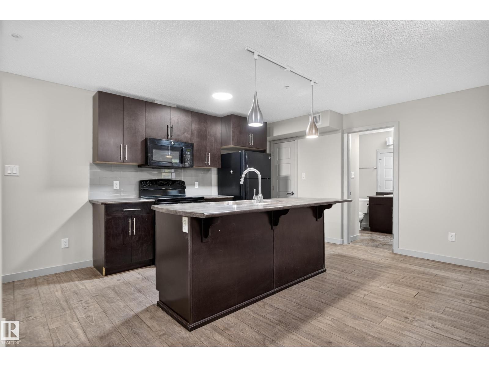#113 – 5510 Schonsee Drive NW, Schonsee — photo 10 of 30: Property photo