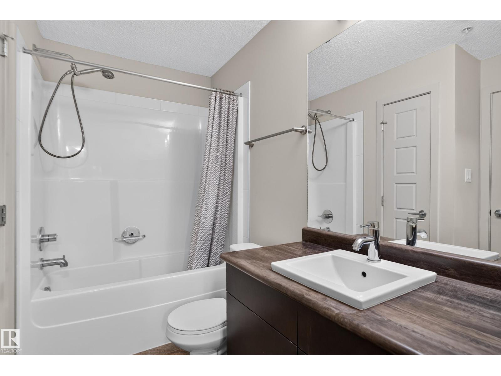 #113 – 5510 Schonsee Drive NW, Schonsee — photo 27 of 30: Property photo
