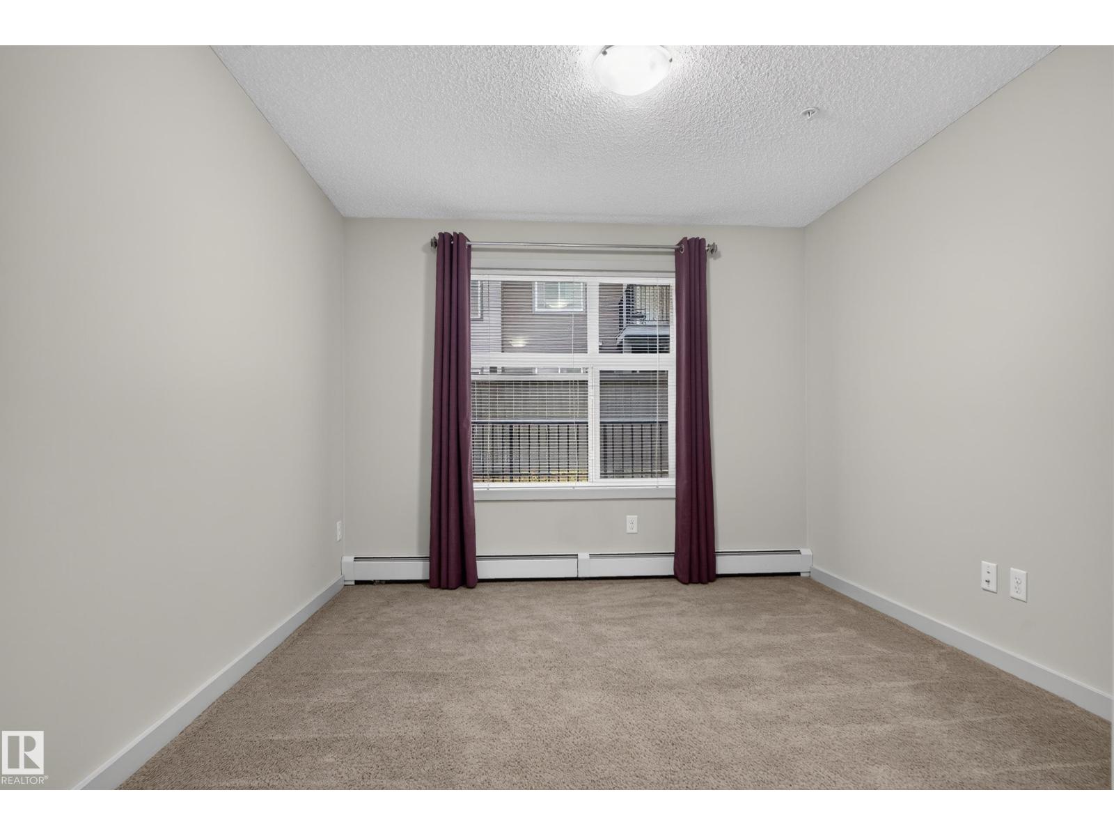 #113 – 5510 Schonsee Drive NW, Schonsee — photo 29 of 30: Property photo
