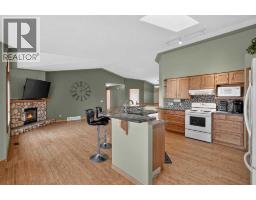 Family room - 50 4 Street, Langdon, AB T0J1X1 Photo 12