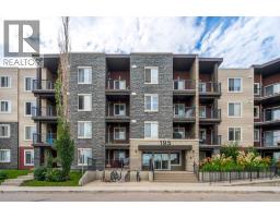 404, 195 Kincora Glen Road NW - photo 1