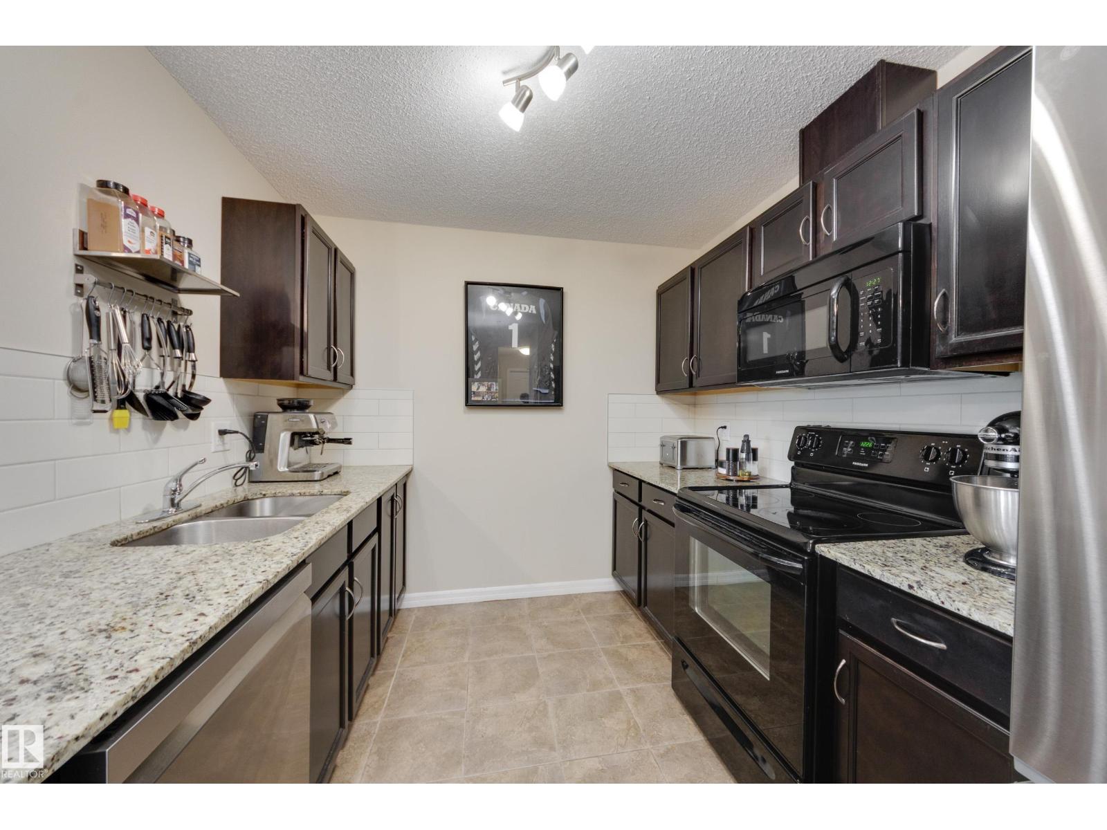 #210 271 CHARLOTTE WY - 10