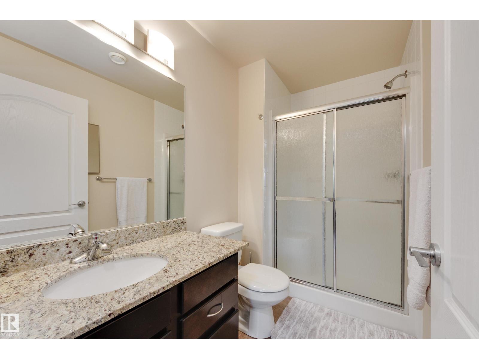 #210 271 CHARLOTTE WY - 24