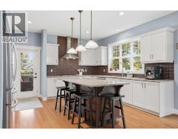 79 Hawk's Landing Drive, Priddis Greens, AB T0L1W3 Photo 18