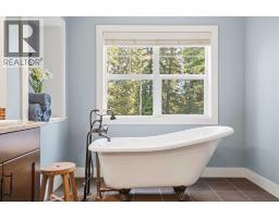 79 Hawk's Landing Drive, Priddis Greens, AB T0L1W3 Photo 32