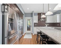 79 Hawk's Landing Drive, Priddis Greens, AB T0L1W3 Photo 20
