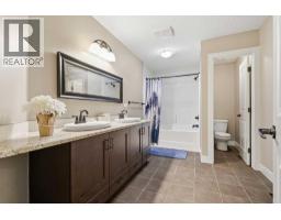 79 Hawk's Landing Drive, Priddis Greens, AB T0L1W3 Photo 37