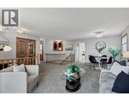 Living room - 39 Woodside Close Nw, Airdrie, AB T4B2C8 Photo 7