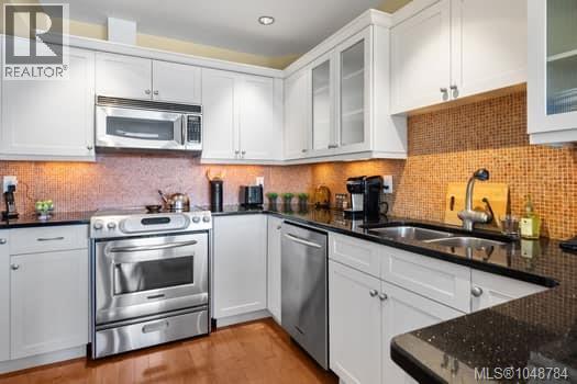 #108 6880 Wallace Dr - Image 14